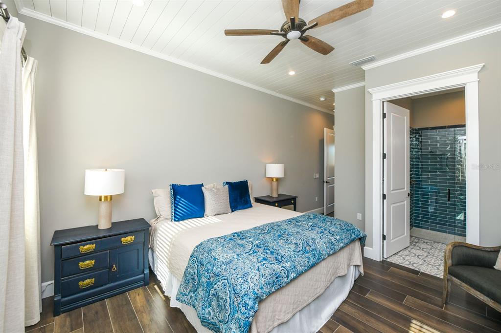 340 Jackson Drive Sarasota, FL 34236 - Photo 43 of 100 a bedroom with a bed and a night stand