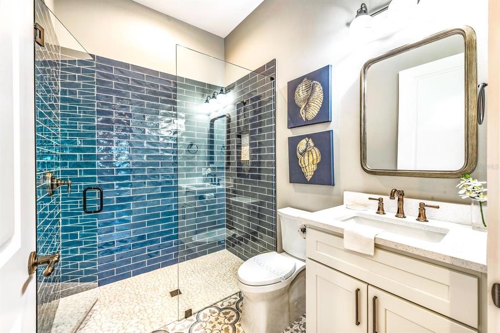 340 Jackson Drive Sarasota, FL 34236 - Photo 61 of 100 a bathroom with a toilet sink and mirror