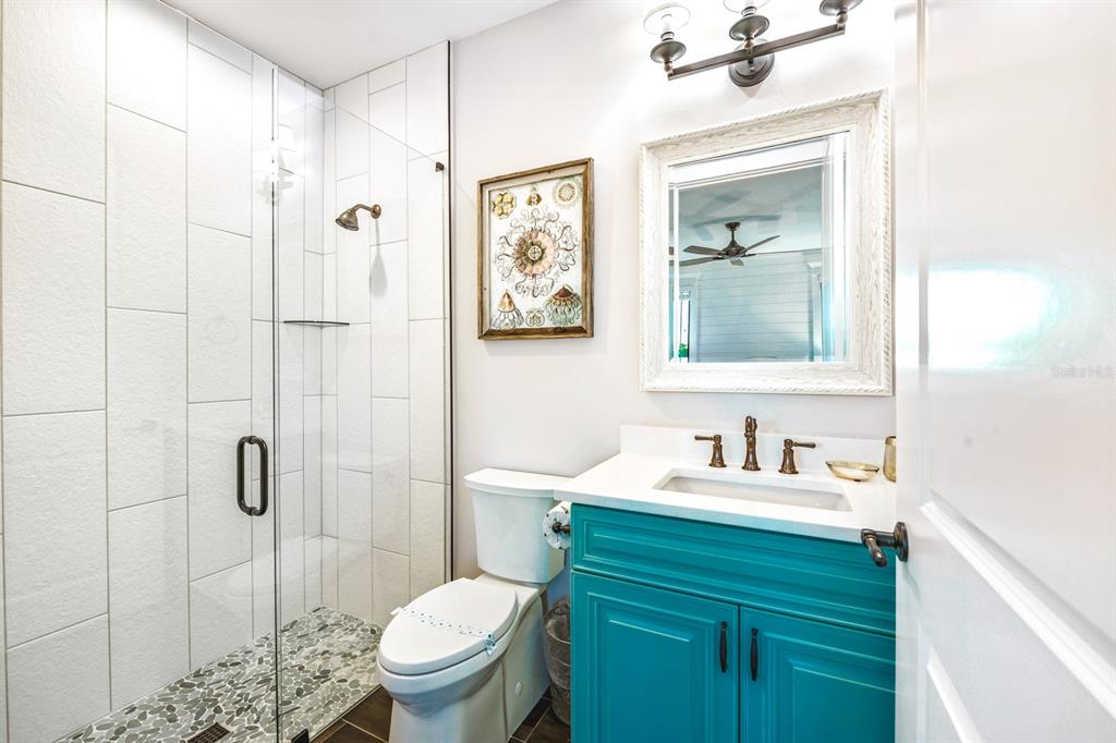 340 Jackson Drive Sarasota, FL 34236 - Photo 63 of 100 a bathroom with a sink toilet and shower