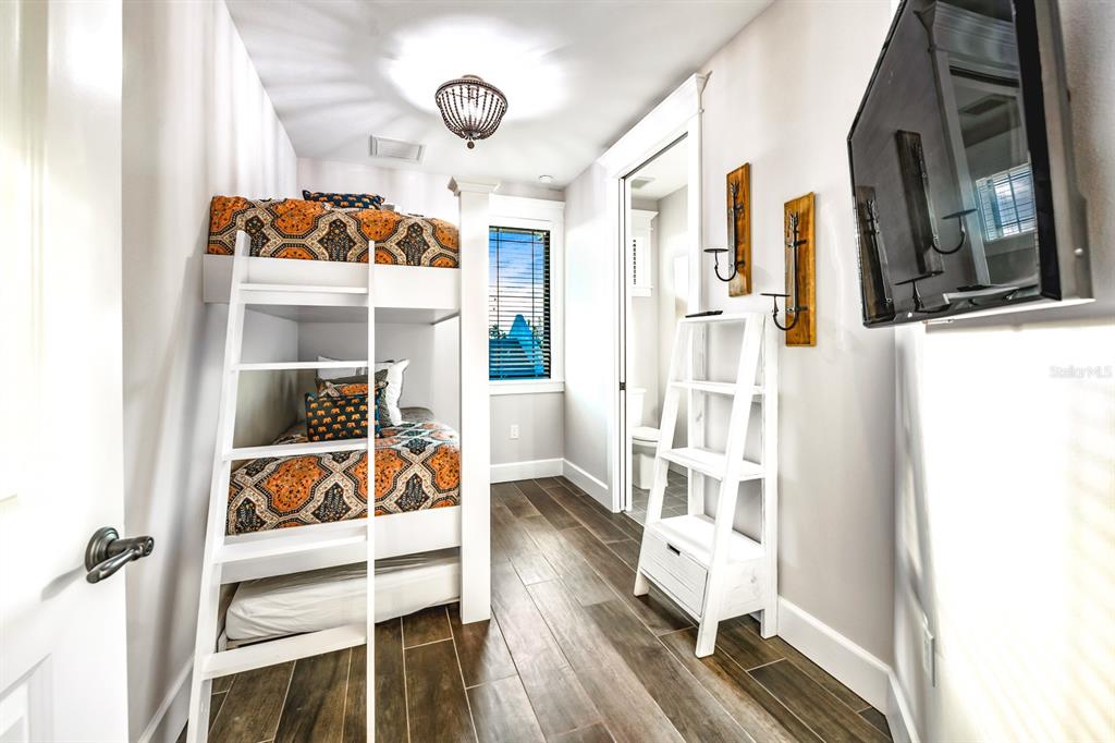340 Jackson Drive Sarasota, FL 34236 - Photo 64 of 100 a view of an entryway with wooden floor