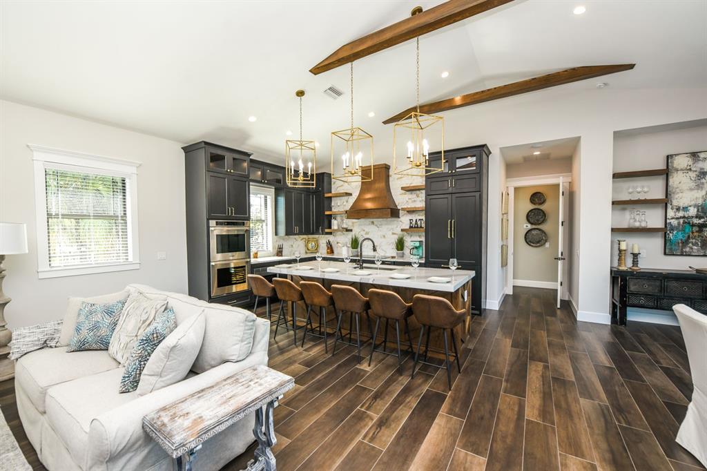 340 Jackson Drive Sarasota, FL 34236 - Photo 9 of 100 a living room with furniture and wooden floor