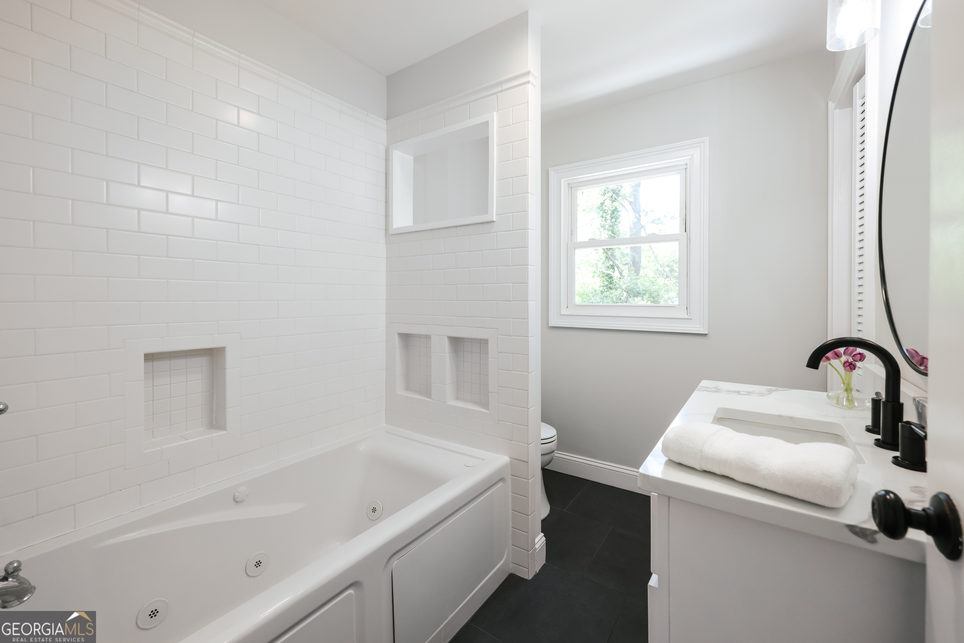 290 Fortson Drive Athens, GA 30606 - Photo 21 of 61 a bathroom with a sink and a bathtub