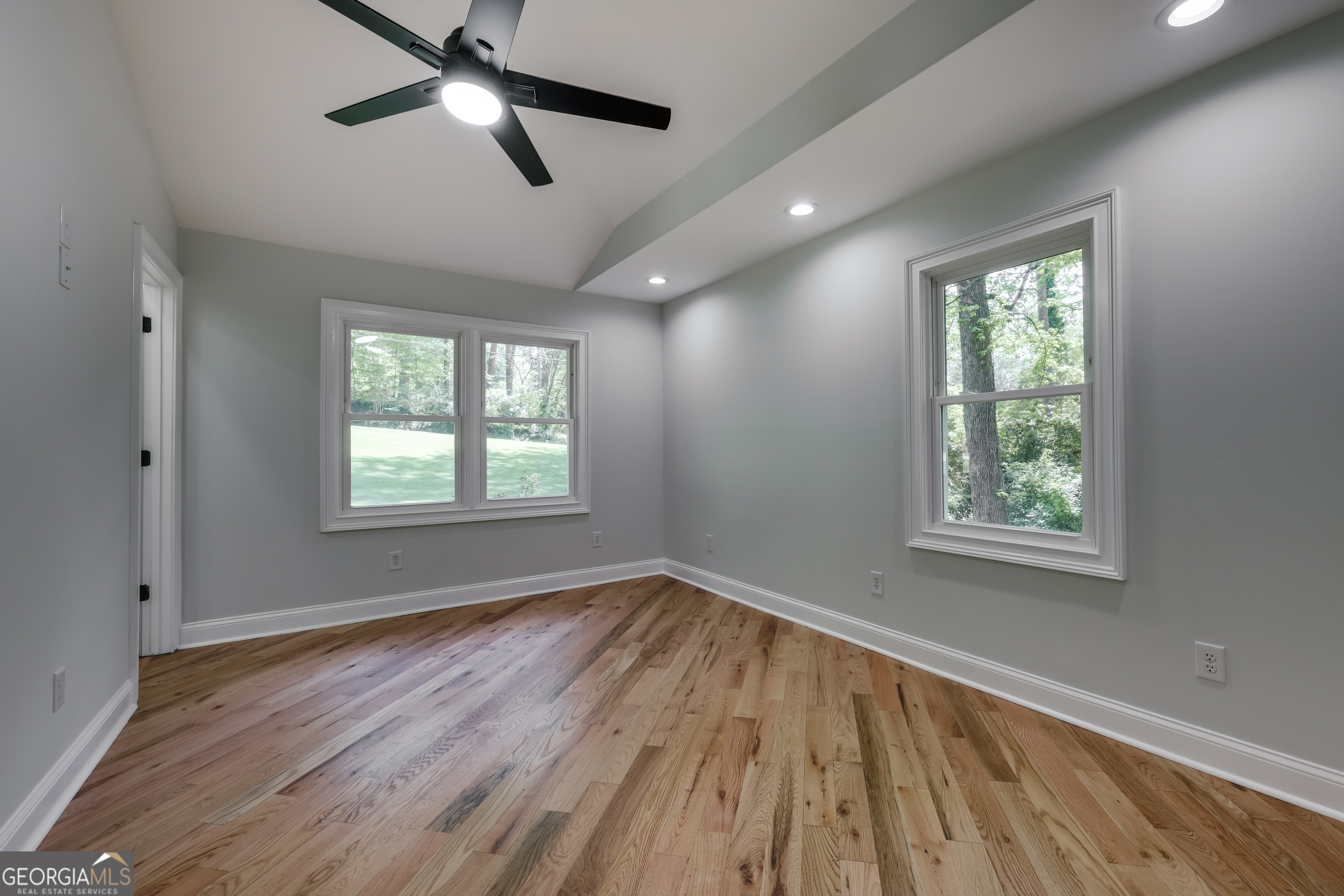 290 Fortson Drive Athens, GA 30606 - Photo 23 of 61 a view of empty room with wooden floor and fan