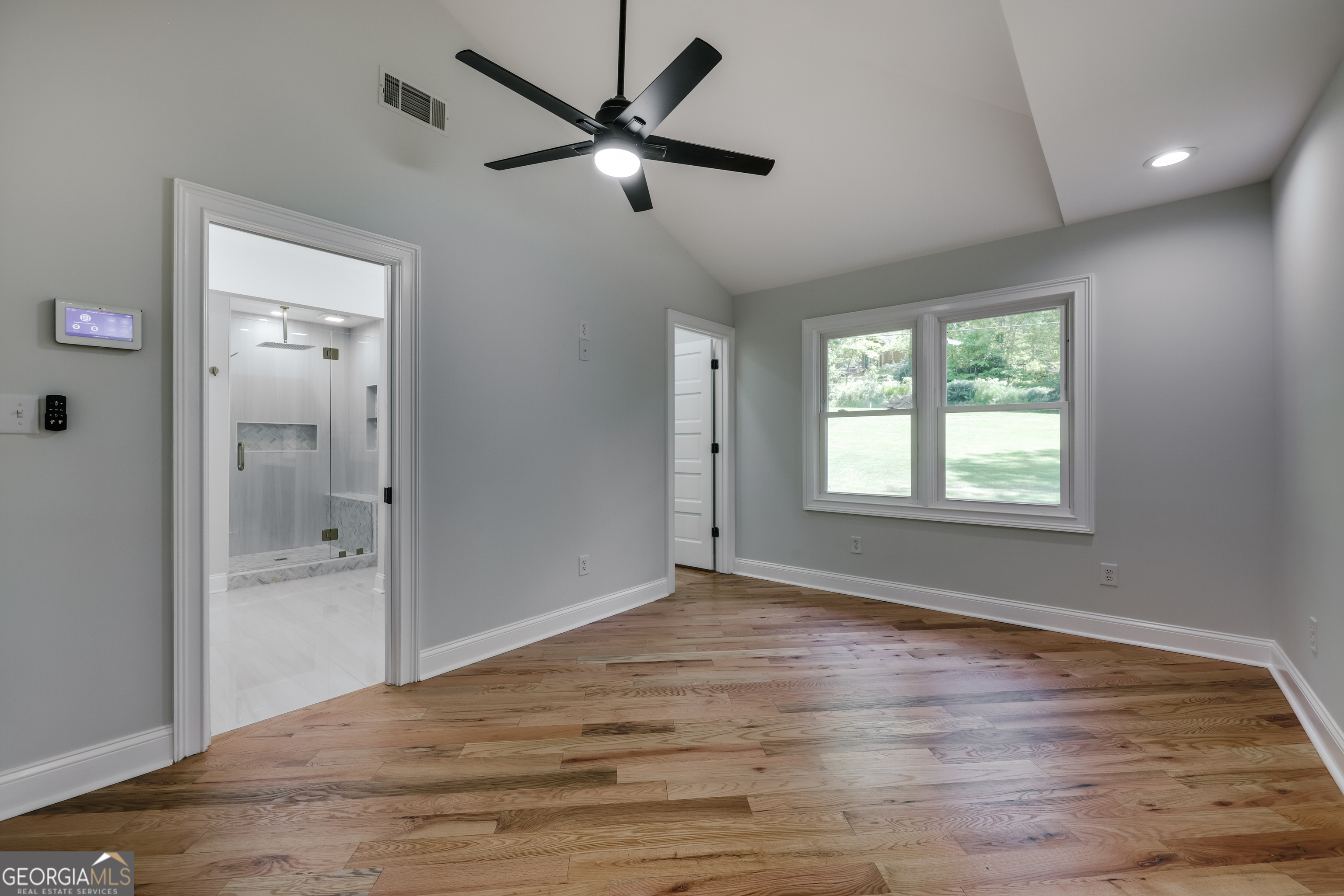290 Fortson Drive Athens, GA 30606 - Photo 24 of 61 wooden floor in an empty room with a window