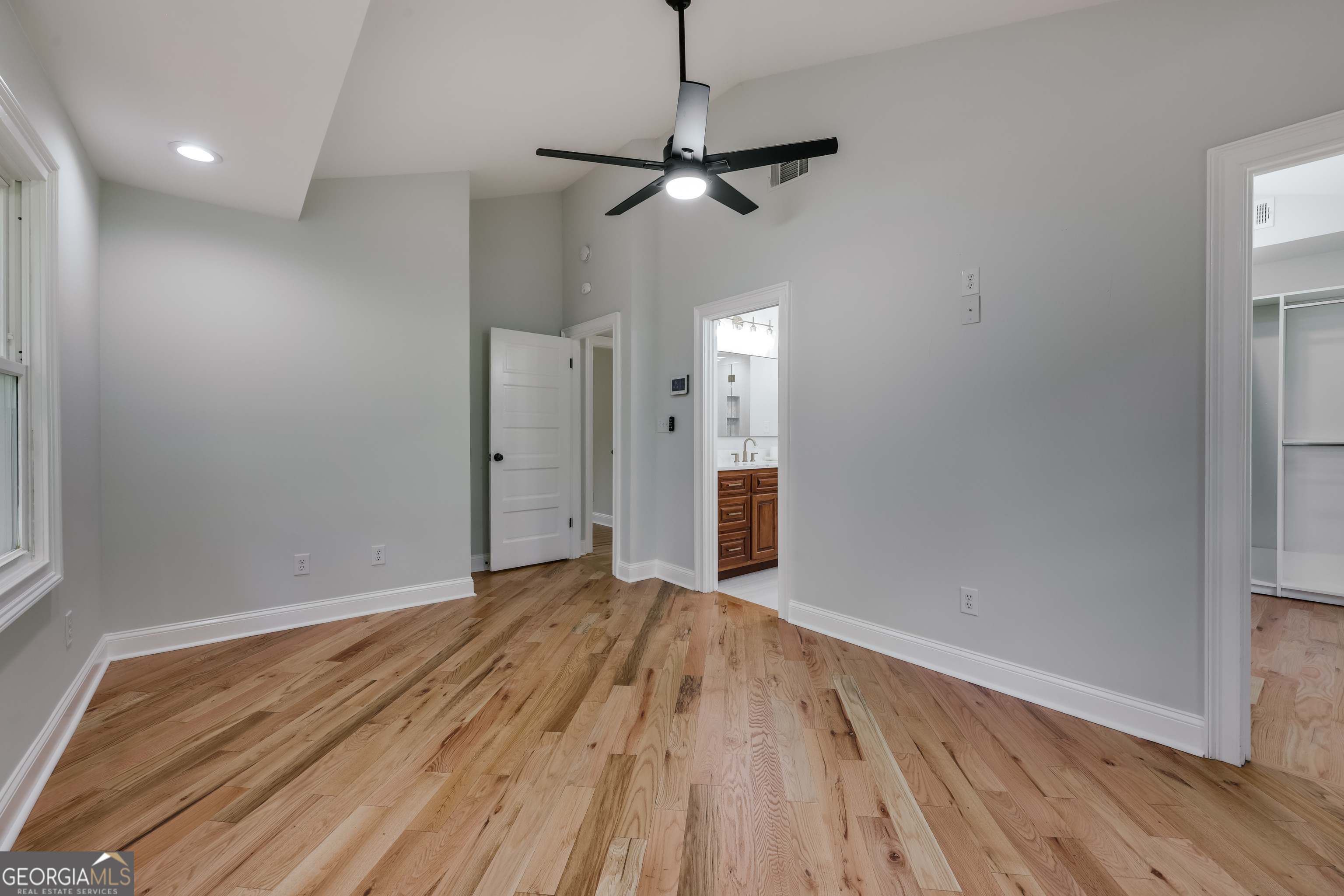 290 Fortson Drive Athens, GA 30606 - Photo 25 of 61 a view of a room with wooden floor ceiling fan and window