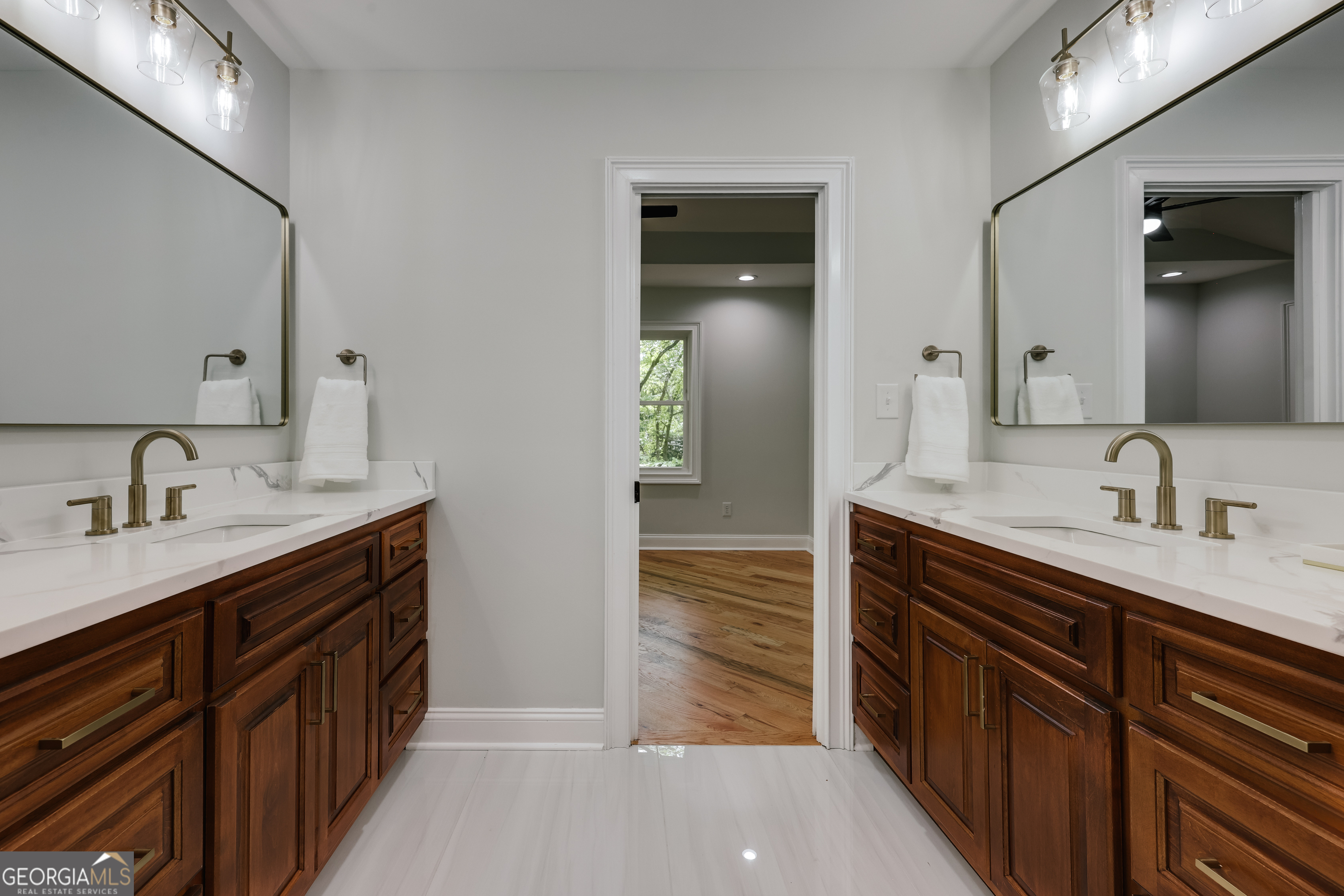 290 Fortson Drive Athens, GA 30606 - Photo 26 of 61 a spacious bathroom with a granite countertop sink and a mirror