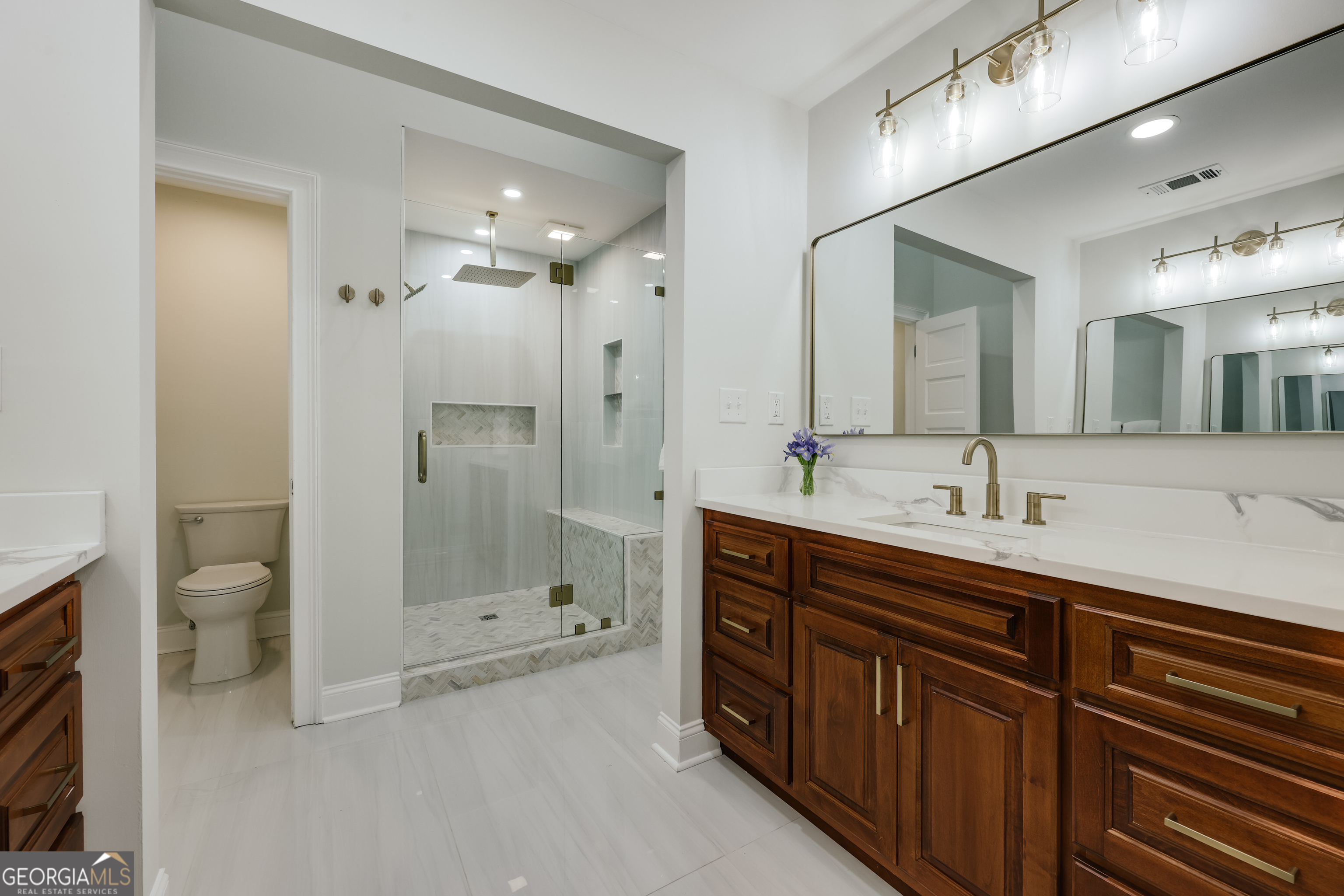 290 Fortson Drive Athens, GA 30606 - Photo 27 of 61 a spacious bathroom with a double vanity sink mirror double and shower