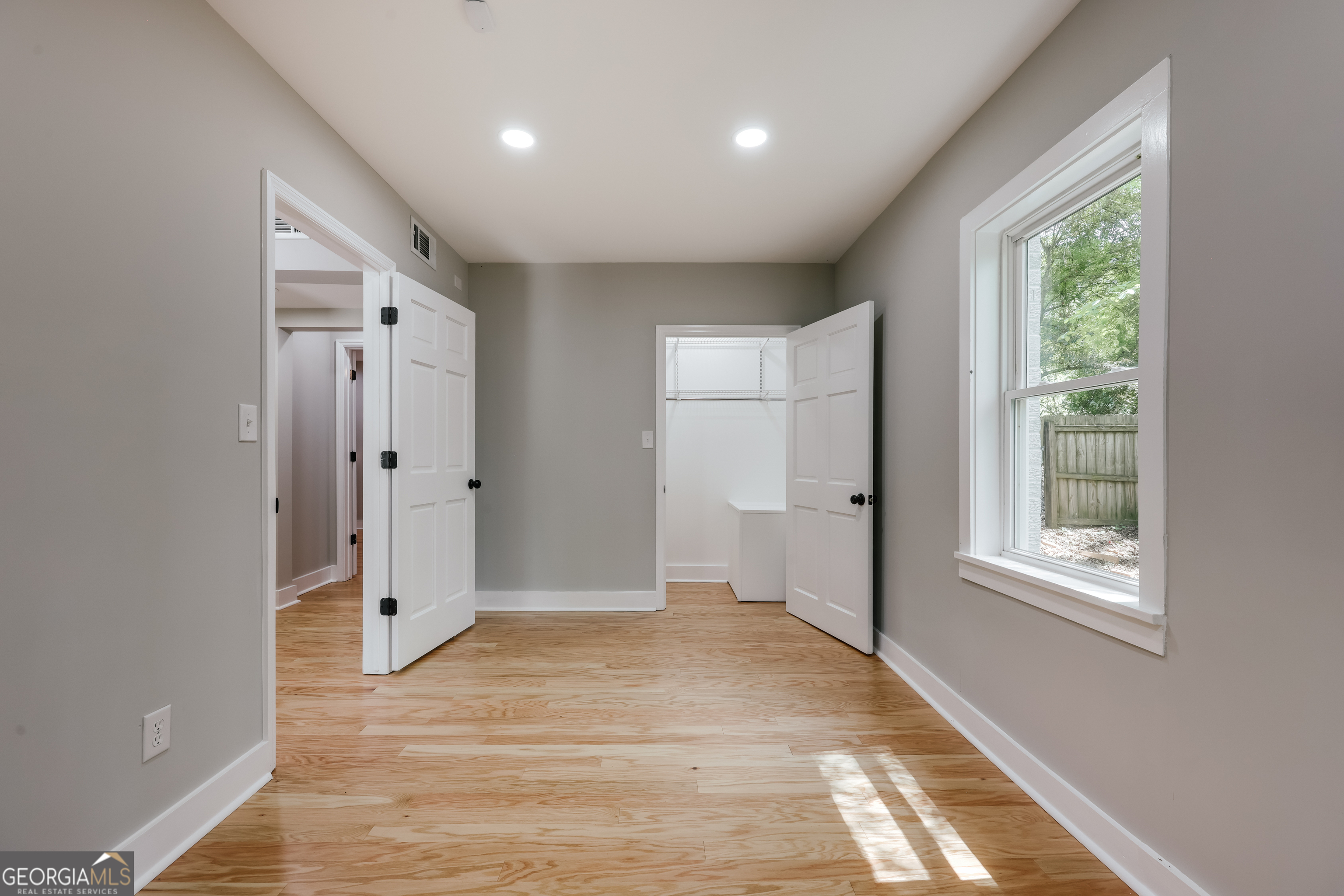 290 Fortson Drive Athens, GA 30606 - Photo 36 of 61 a view of a hallway with wooden floor and a bathroom