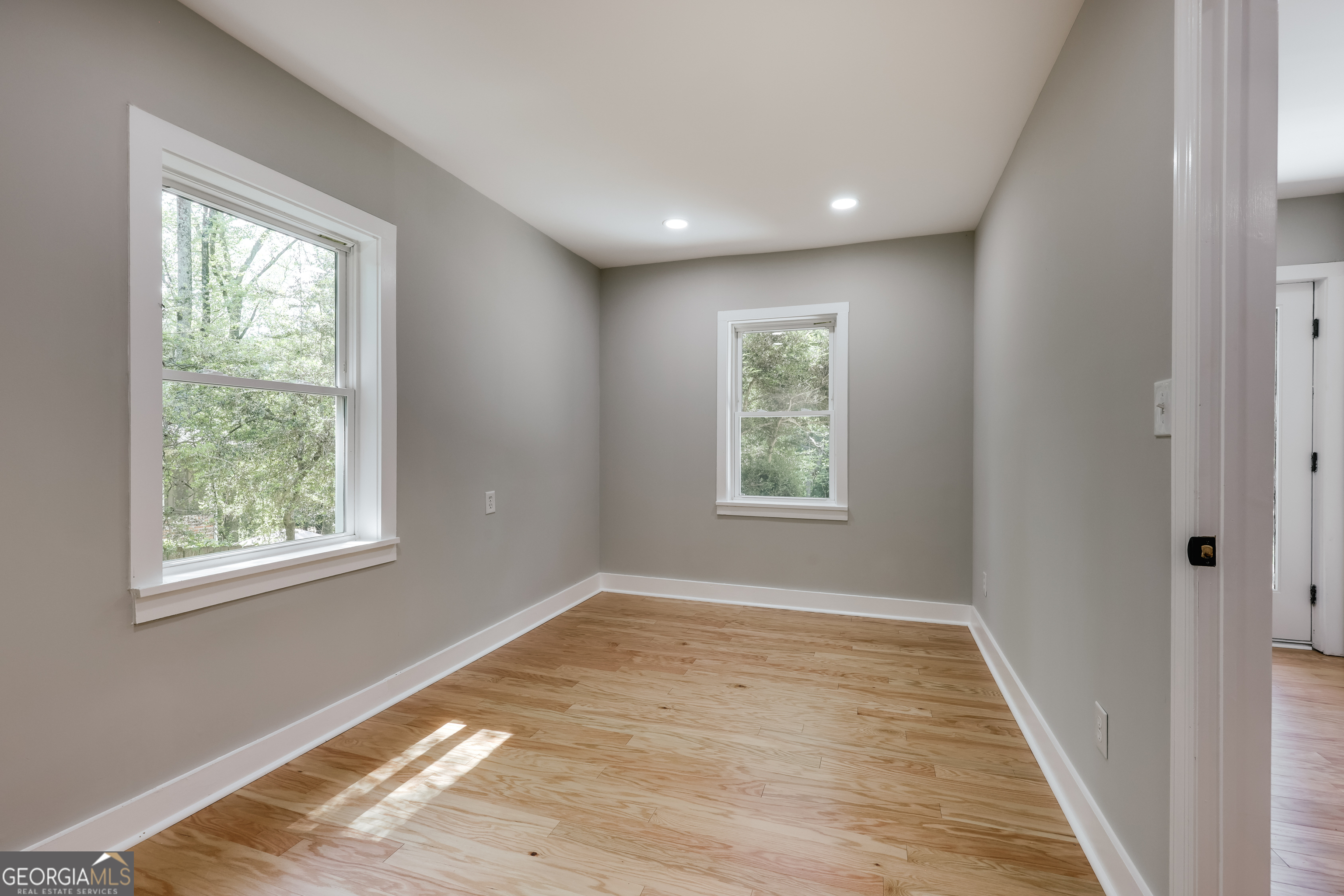 290 Fortson Drive Athens, GA 30606 - Photo 37 of 61 a view of empty room with wooden floor