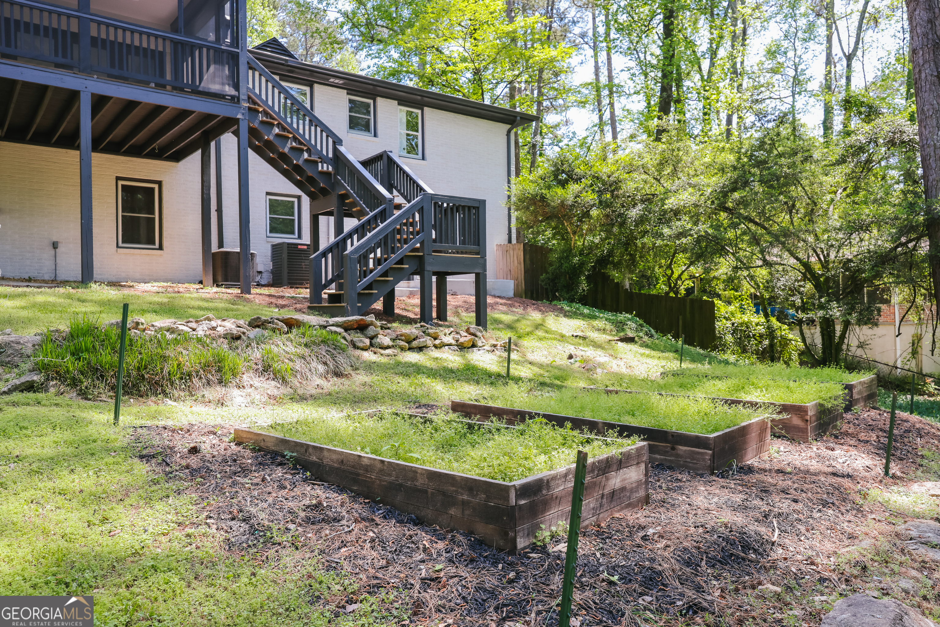 290 Fortson Drive Athens, GA 30606 - Photo 49 of 61 a view of a house with backyard and sitting area