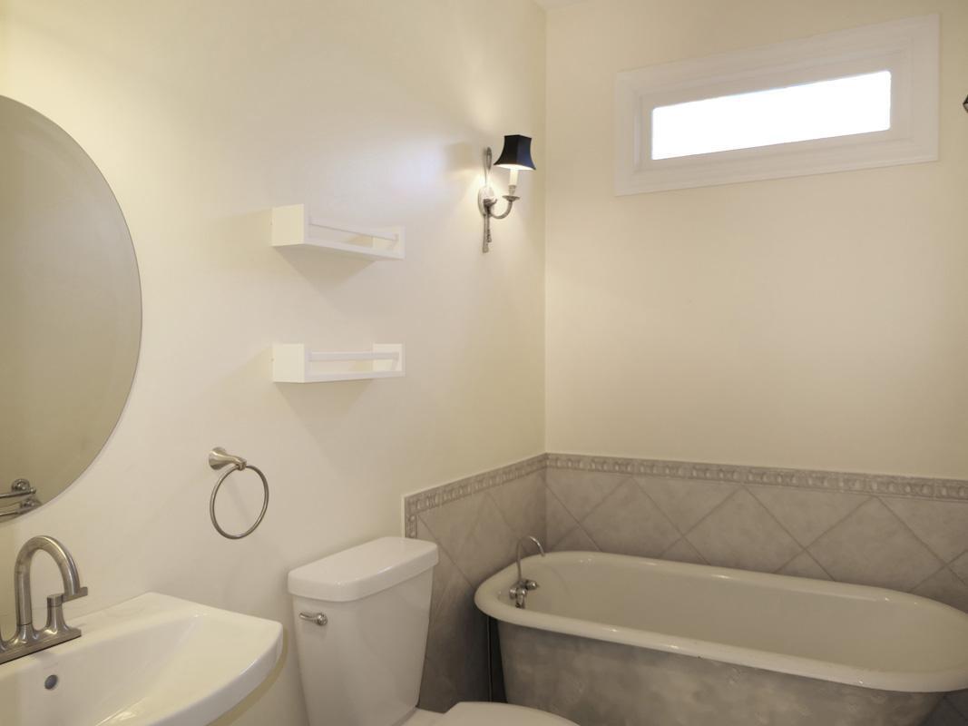 5330 Foxlair Road Chapel Hill, NC 27516 - Photo 22 of 43 a bathroom with a granite countertop toilet and a sink