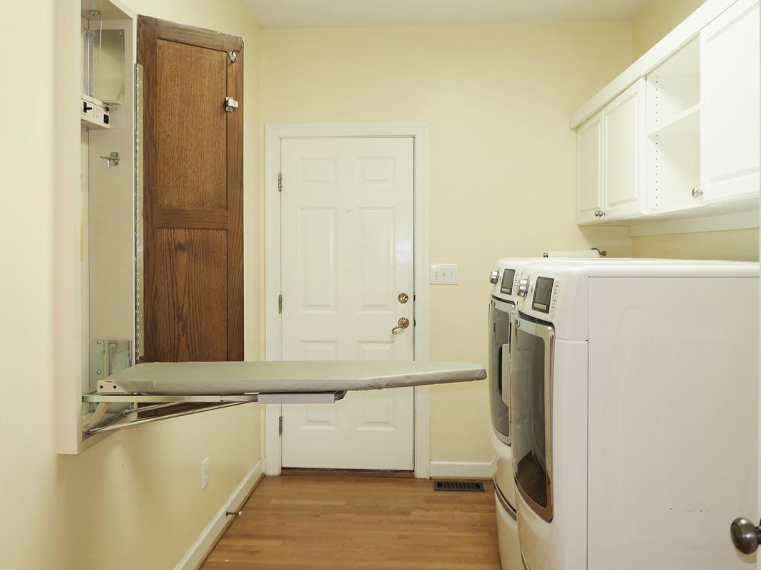 5330 Foxlair Road Chapel Hill, NC 27516 - Photo 23 of 43 a bathroom with a tub sink and mirror