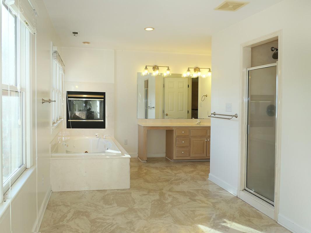 5330 Foxlair Road Chapel Hill, NC 27516 - Photo 26 of 43 view of a bathroom with a bathtub and a sink