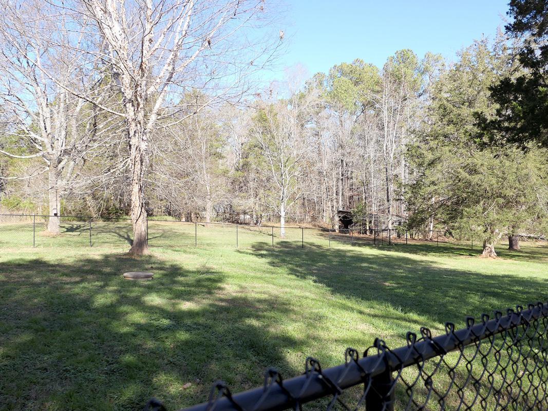 5330 Foxlair Road Chapel Hill, NC 27516 - Photo 37 of 43 a view of a park with large trees