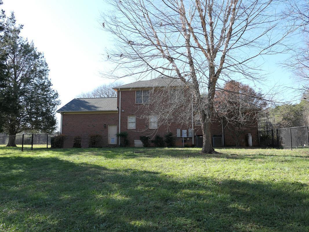 5330 Foxlair Road Chapel Hill, NC 27516 - Photo 39 of 43 a view of a backyard with a garden