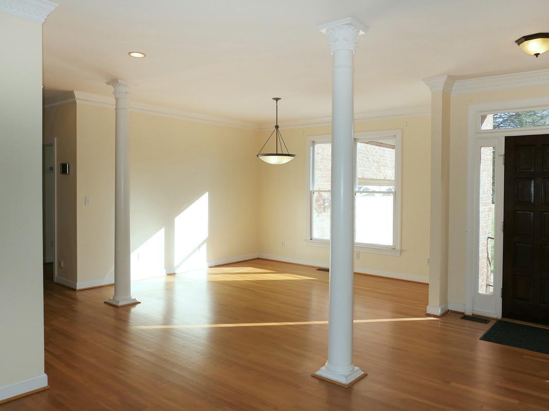 5330 Foxlair Road Chapel Hill, NC 27516 - Photo 7 of 43 a view of empty room with wooden floor and fan