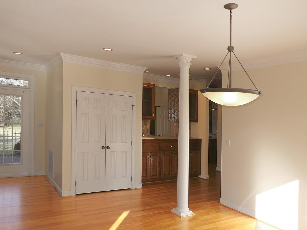 5330 Foxlair Road Chapel Hill, NC 27516 - Photo 10 of 43 a view of a room with wooden floor and entryway