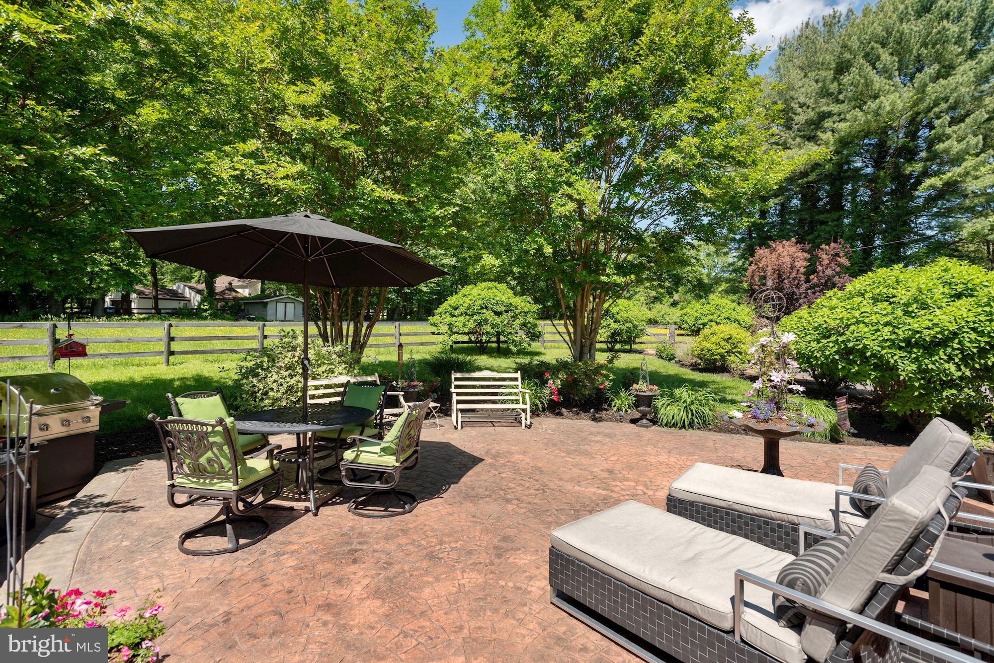 636 Walker Road Great Falls, VA 22066 - Photo 2 of 23 Two acres with outdoor patio living.
