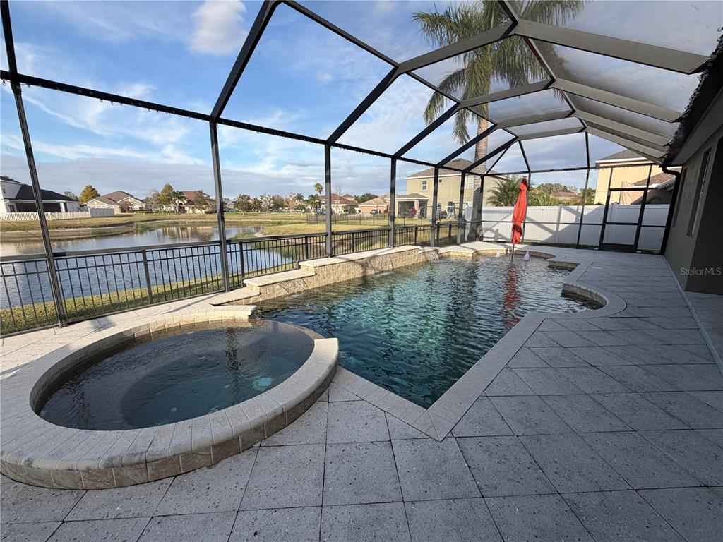 11342 77th Street East Parrish, FL 34219 - Photo 26 of 31 a view of swimming pool with a lounge chairs