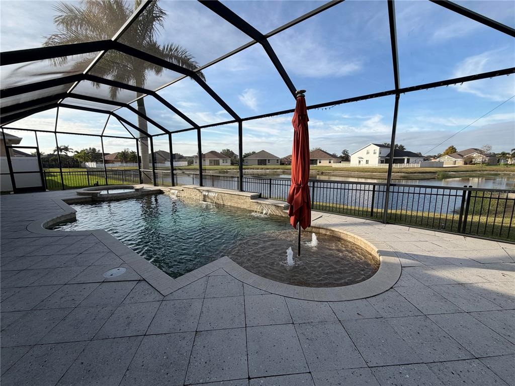 11342 77th Street East Parrish, FL 34219 - Photo 27 of 31 a view of swimming pool with a lounge chair
