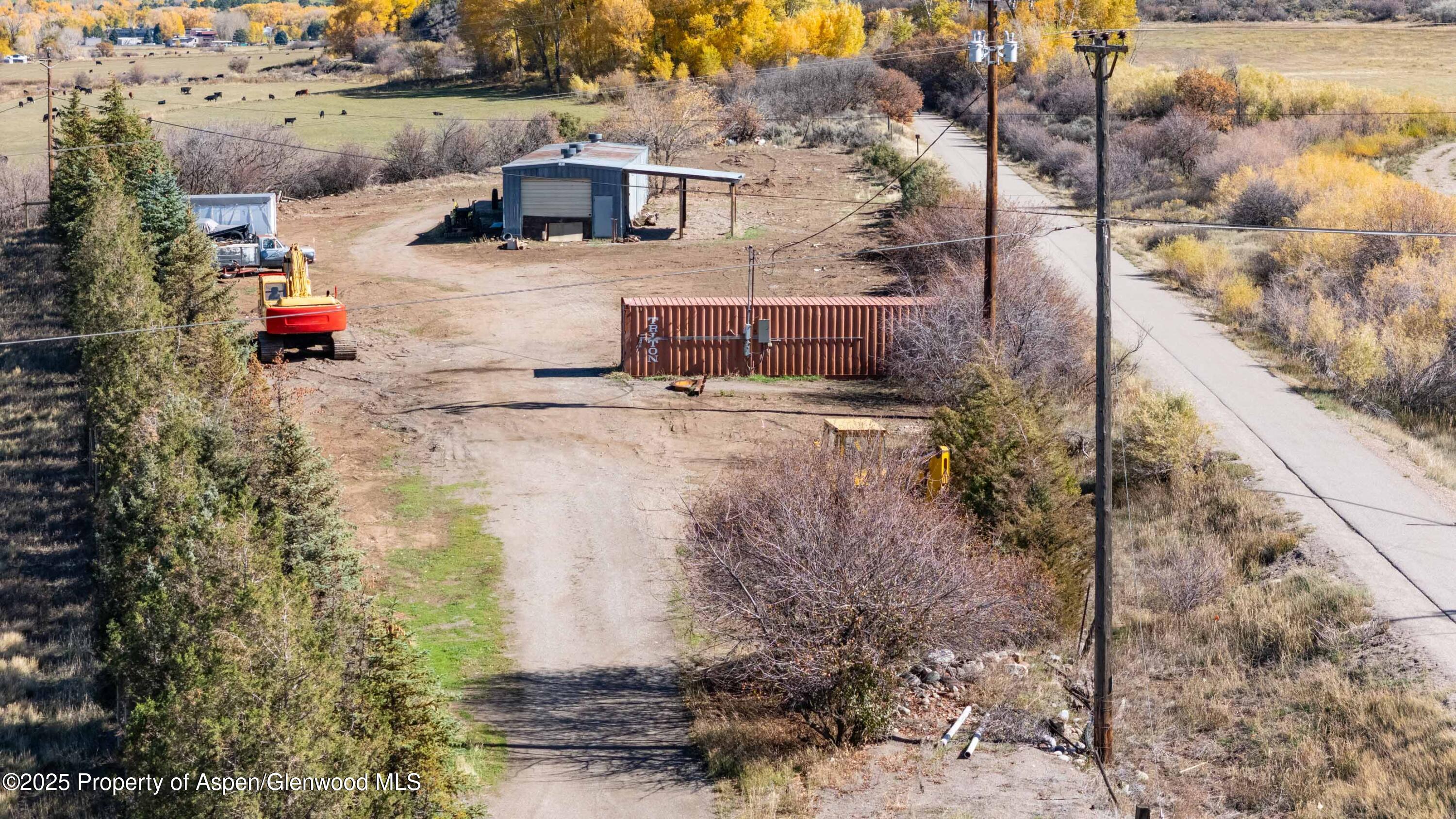 21401 Highway 82 Basalt, CO 81621 - Photo 12 of 16 a view of a house with a yard