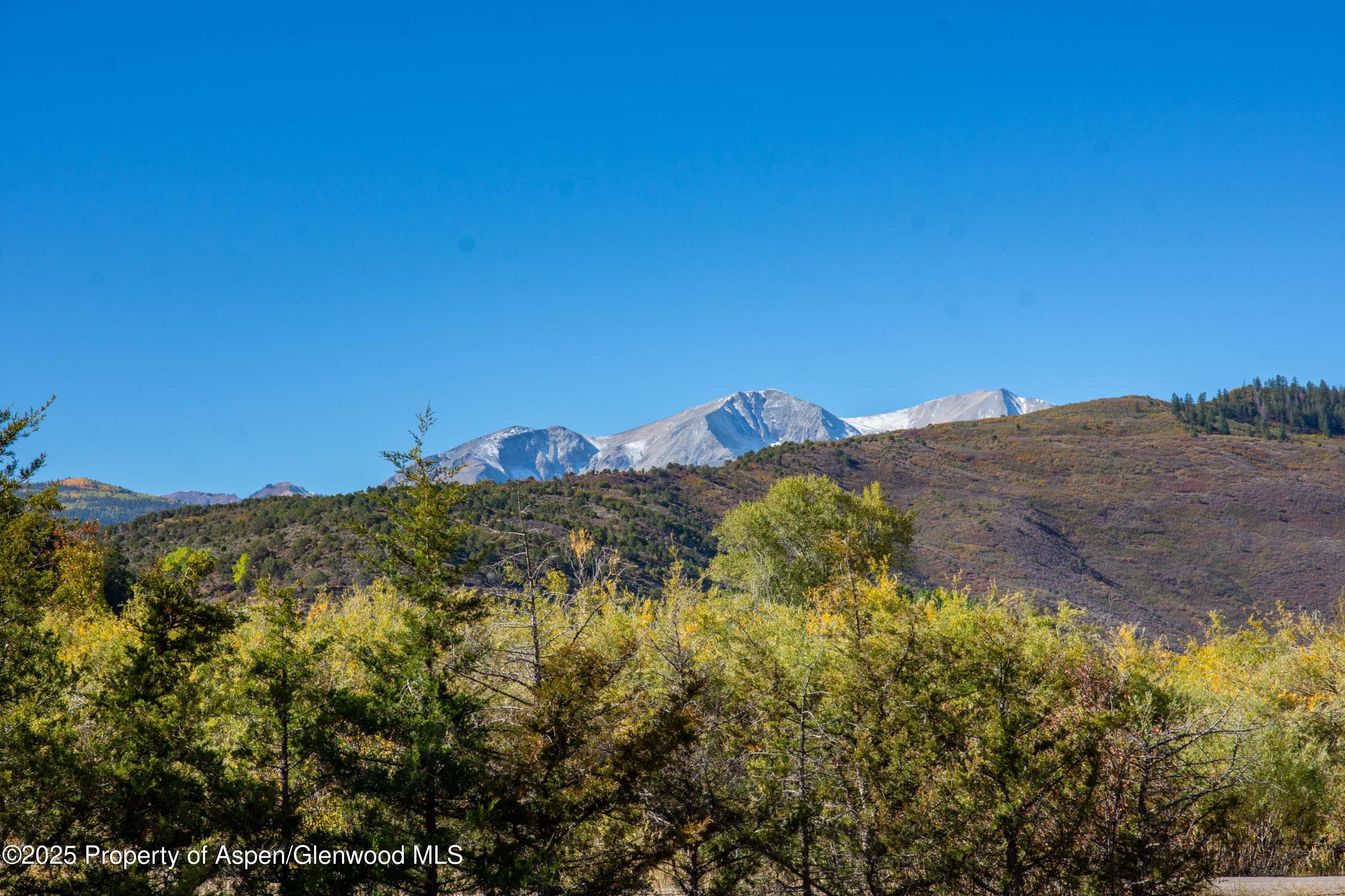 21401 Highway 82 Basalt, CO 81621 - Photo 16 of 16 a view of a houses with a yard