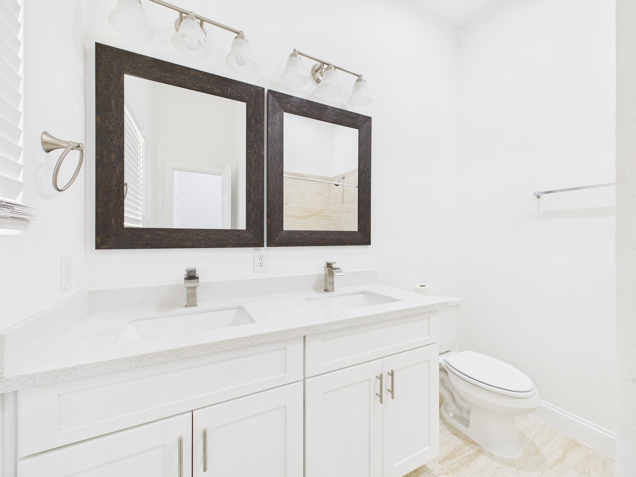 4619 Stassen Street, Unit B Houston, TX 77051 - Photo 16 of 29 a bathroom with a toilet sink and mirror