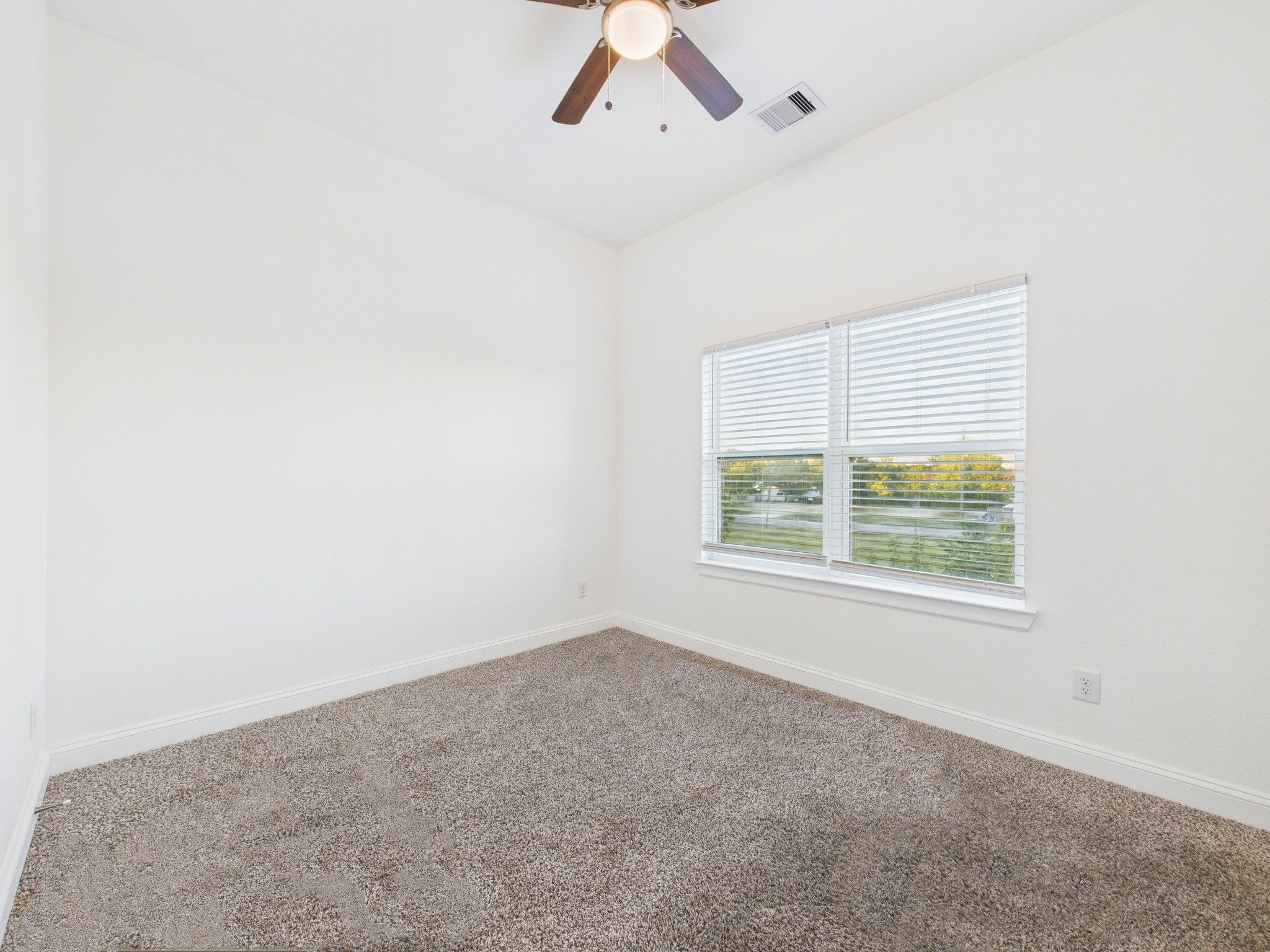 4619 Stassen Street, Unit B Houston, TX 77051 - Photo 24 of 29 an empty room with a window