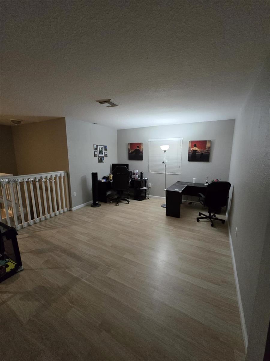 13994 Southwest 278th Street Homestead, FL 33032 - Photo 6 of 19 a living room with furniture and a couch