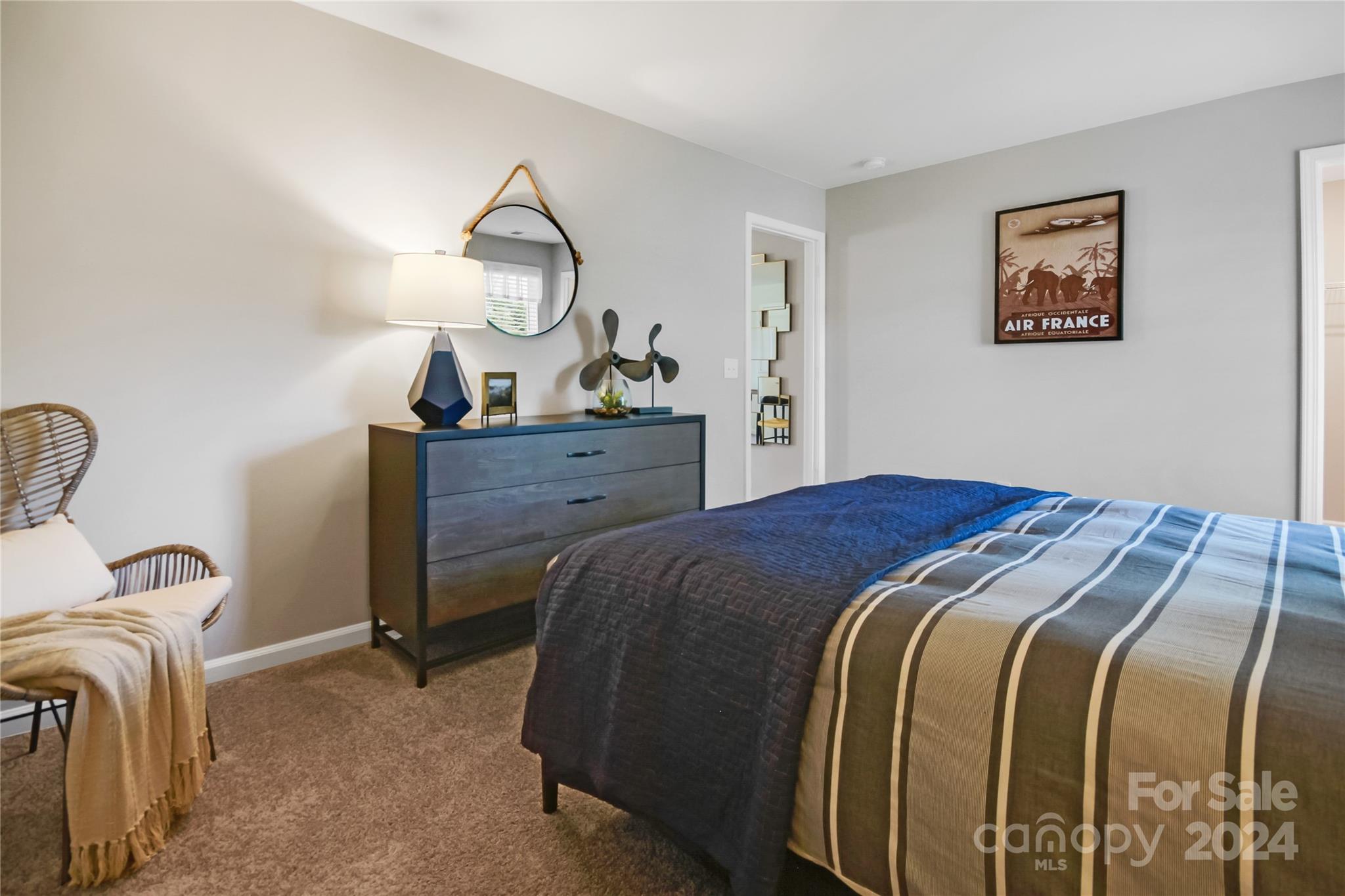 3174 Laurel Brook Drive Denver, NC 28037 - Photo 20 of 32 a bedroom with a bed and window