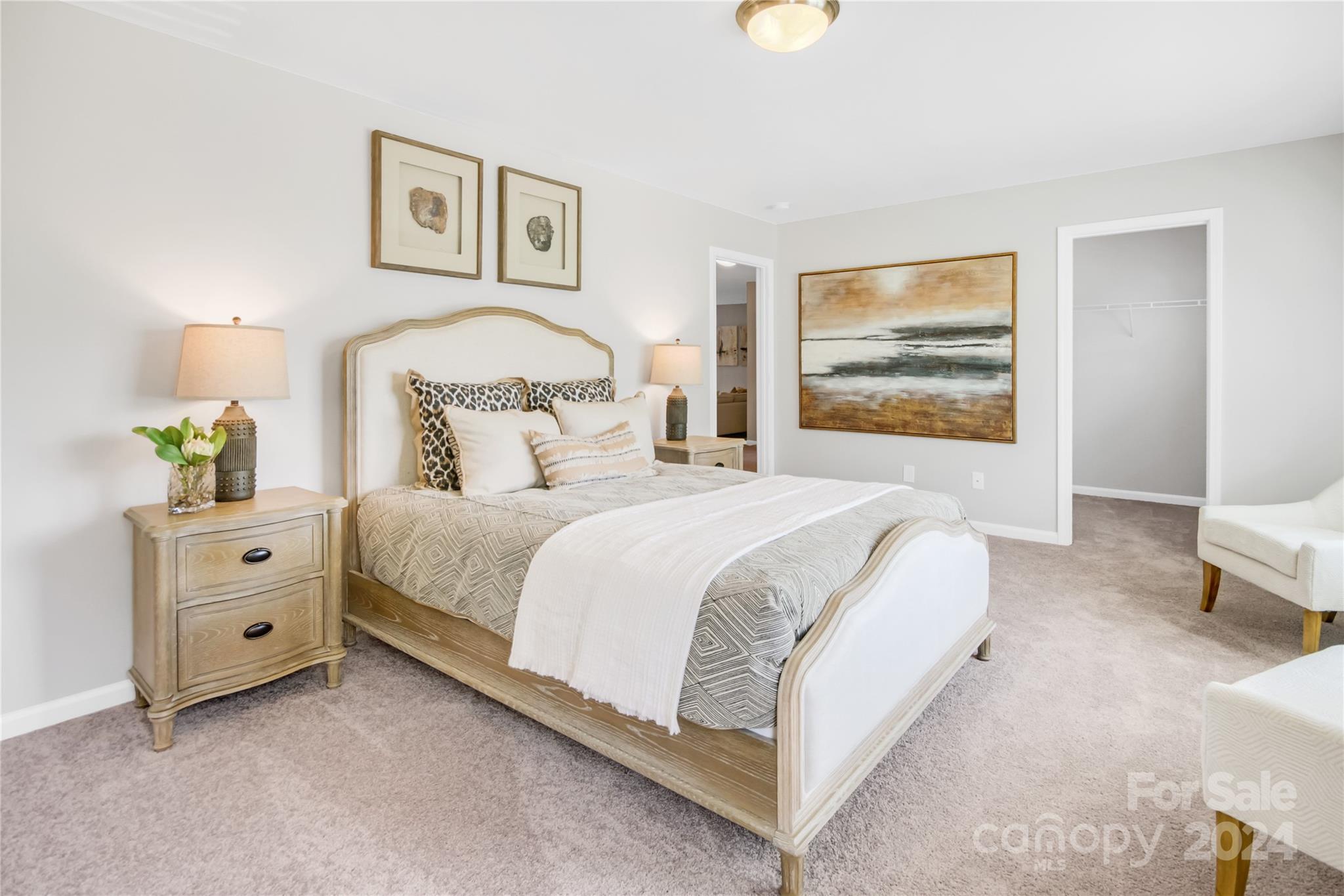 3174 Laurel Brook Drive Denver, NC 28037 - Photo 22 of 32 a spacious bedroom with a bed and a window