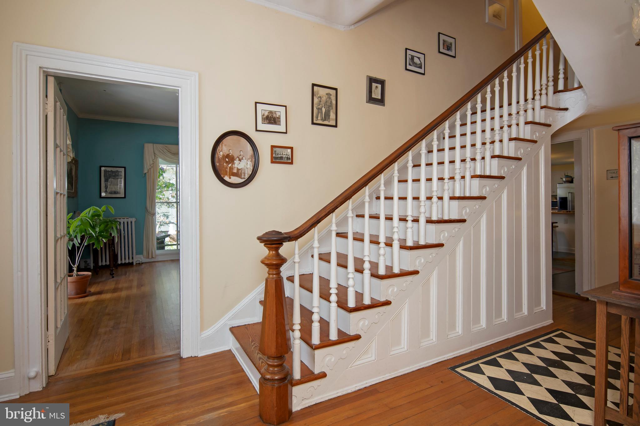 113 High Street Cambridge, MD 21613 - Photo 9 of 56 Beautiful Staircase Looking Towards Dining Room