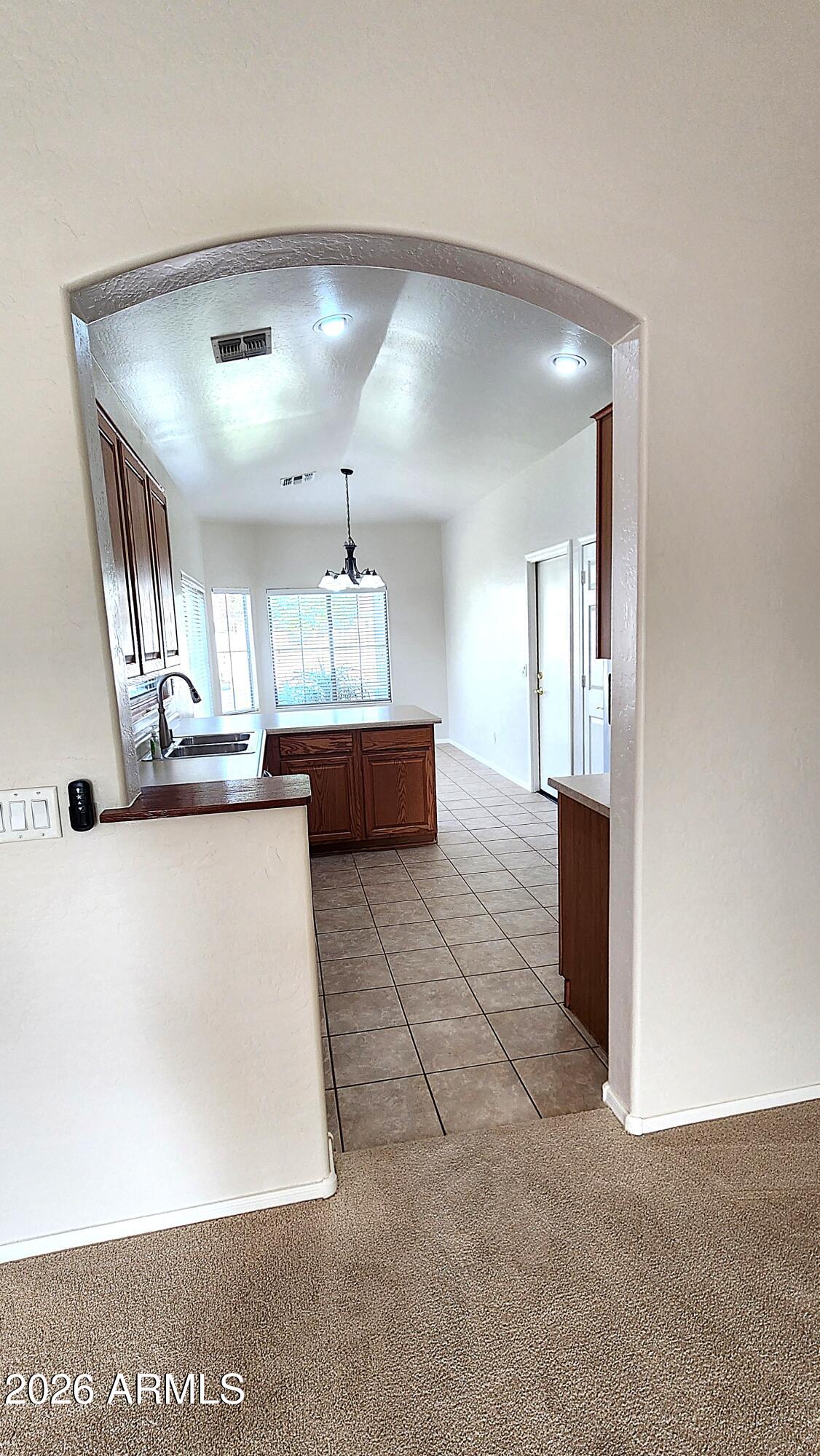 3566 South Seton Avenue Gilbert, AZ 85297 - Photo 8 of 41 20260624_164731