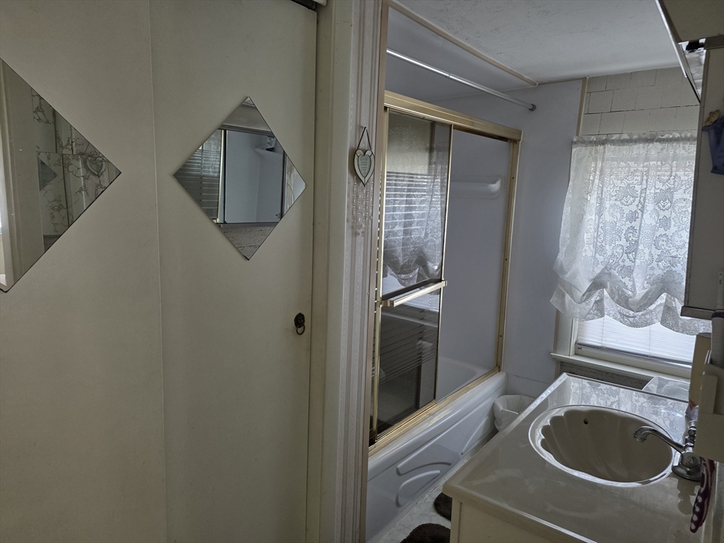 304 High Street Randolph, MA 02368 - Photo 15 of 35 a utility room with dryer and washer