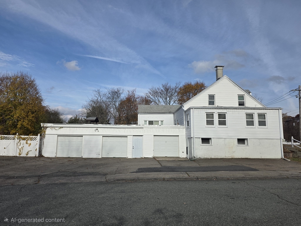 304 High Street Randolph, MA 02368 - Photo 3 of 35 a view of a white house with a big yard and large trees