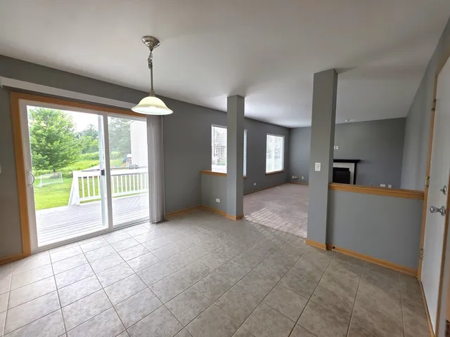 a view of a room with window swimming pool and chandelier