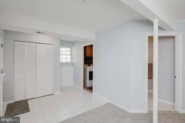 a room with furniture and a window