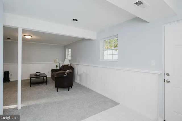 a bathroom with a sink a toilet and vanity