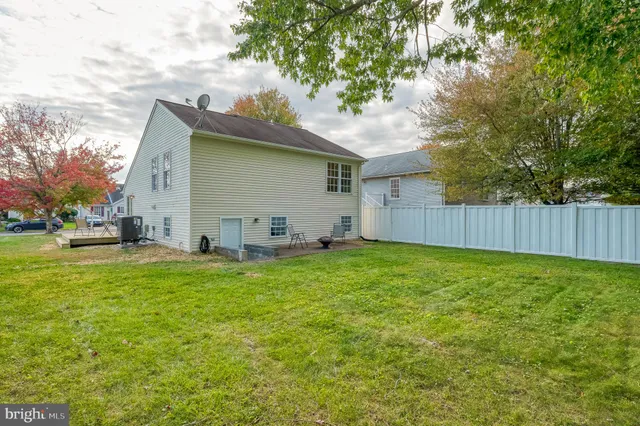 a backyard of a house with seating space