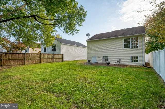 a huge green field with lots of trees