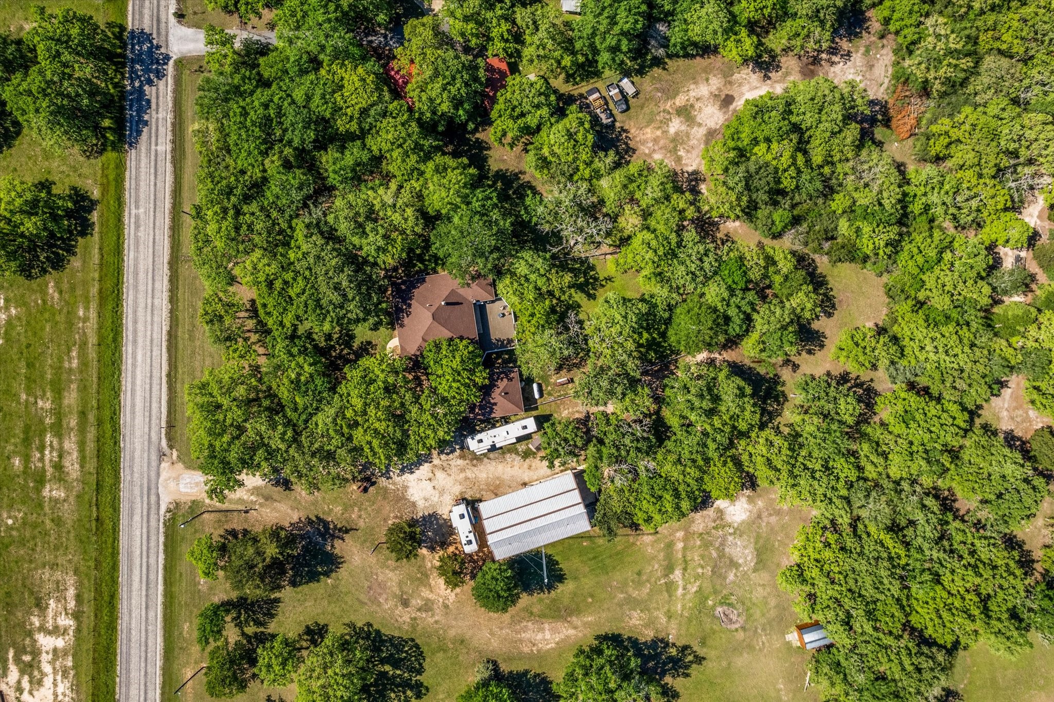 2525 Peach Creek Road College Station, TX 77845 - Photo 35 of 41 Aerial view of the home nestled under the trees