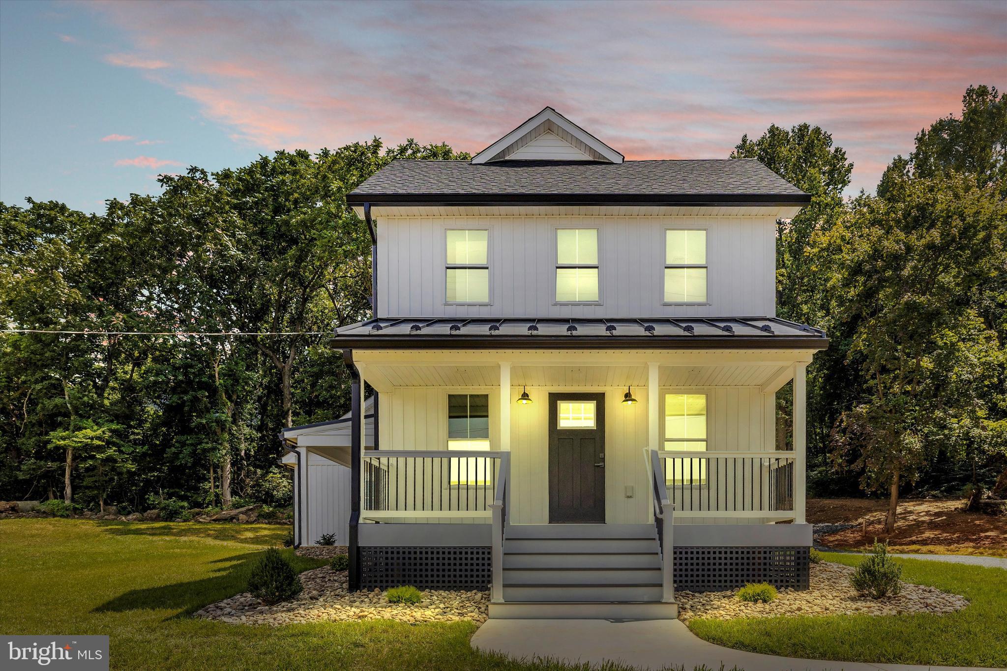 14241 Ritchie Road Cascade, MD 21719 - Photo 1 of 67 a front view of a house with a yard