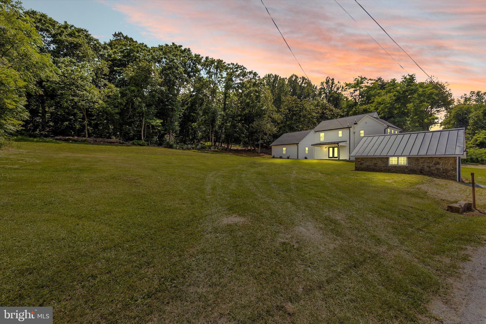 14241 Ritchie Road Cascade, MD 21719 - Photo 5 of 67 a view of a house with a yard
