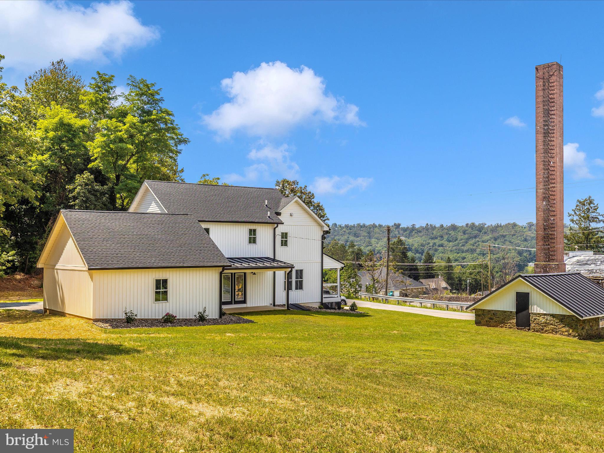 14241 Ritchie Road Cascade, MD 21719 - Photo 61 of 67 a view of a house with a swimming pool