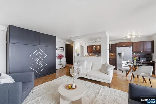 a living room with furniture and a table