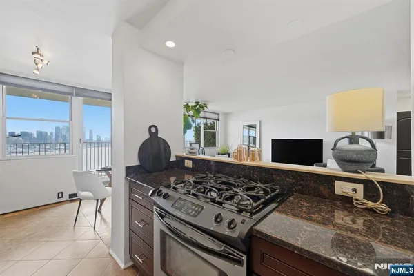 a kitchen with a stove and a sink