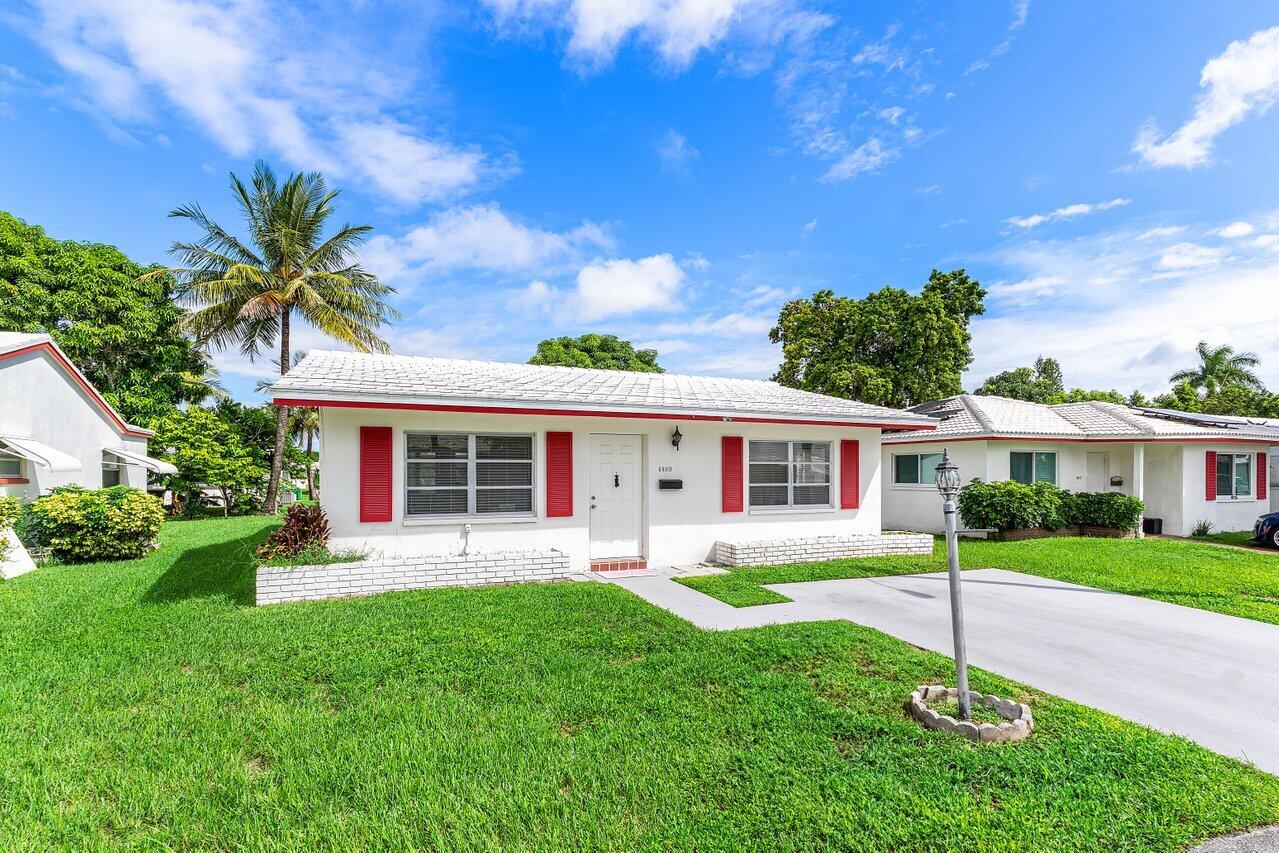 6809 Northwest 75th Street Tamarac, FL 33321 - Photo 2 of 22 Front of Home