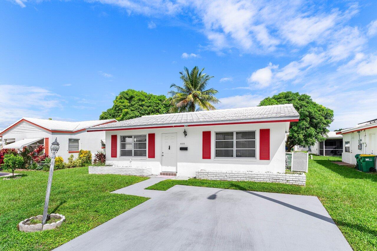 6809 Northwest 75th Street Tamarac, FL 33321 - Photo 3 of 22 Front of Home