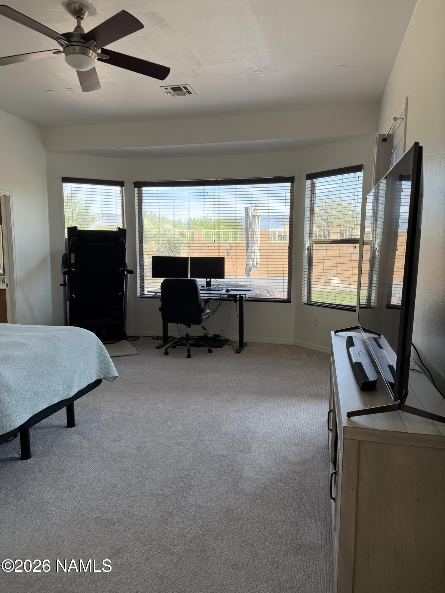 9587 South Via Bandera Vail, AZ 85641 - Photo 11 of 28 a living room with furniture and a flat screen tv