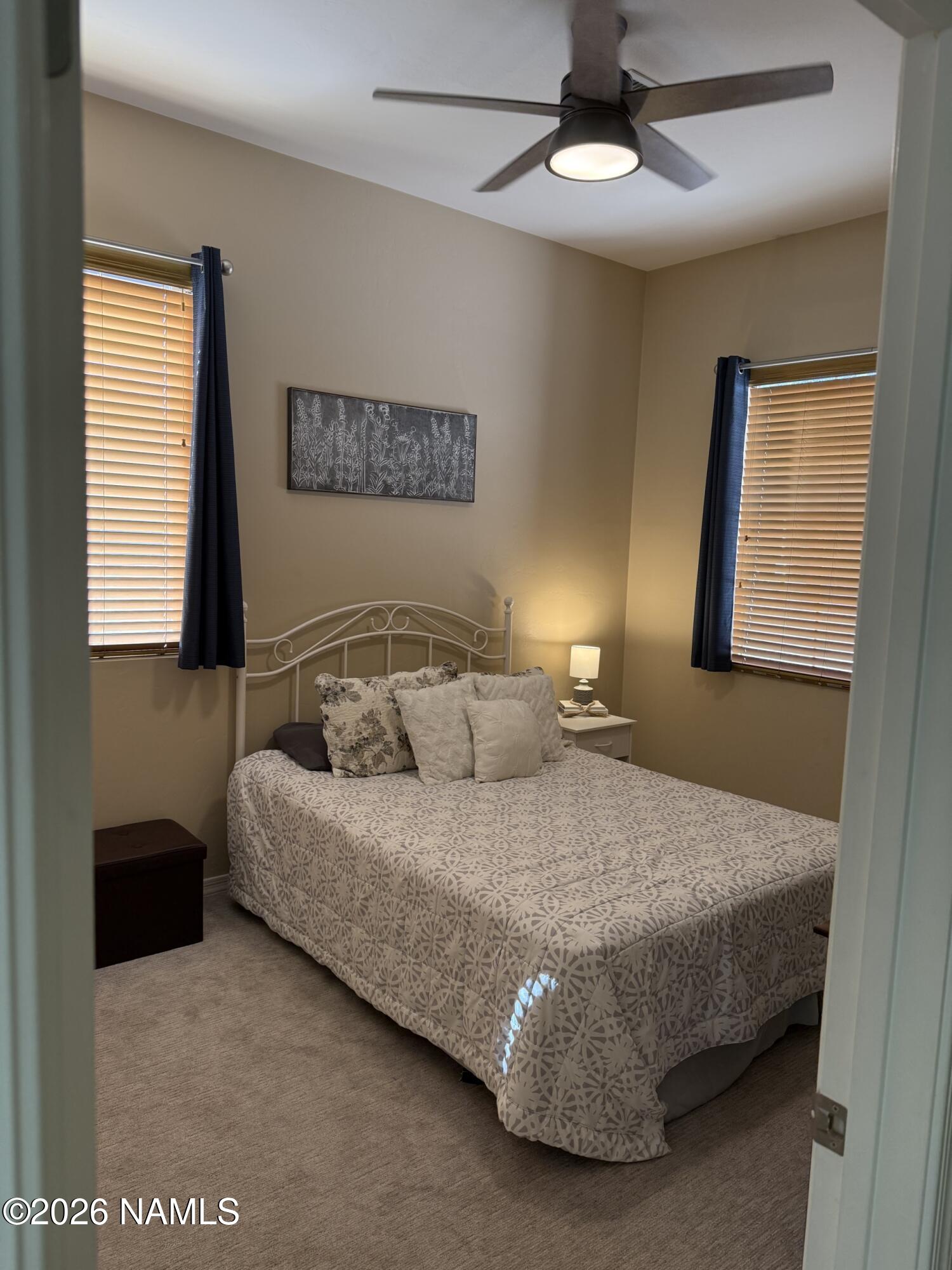 9587 South Via Bandera Vail, AZ 85641 - Photo 17 of 28 a bedroom with a bed and a window